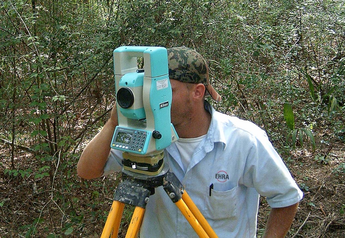 Land surveyor measuring property - expropriation compensation valuation Ontario