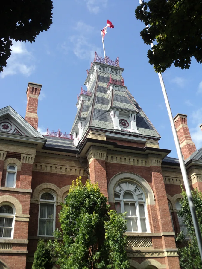 Dufferin County Courthouse main entrance Orangeville Ontario with Canadian flag